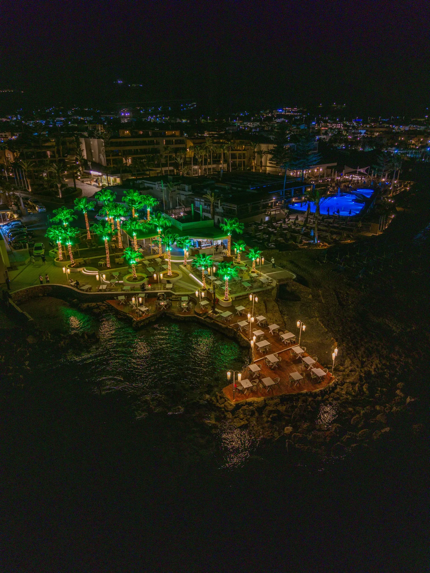 Aerial night view of Thalassa Bar Restaurant beside the sea